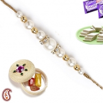 Handcrafted Natural Pearl Rakhi with American Diamonds,Pearl Rakhis, Buy Rakhi, Send Rakhi to India, Rakhi Gifts, Rakhis Online