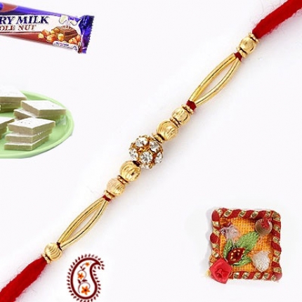 Gold Plated Ball Rakhi studded with American Diamonds