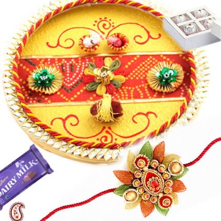 Traditional Bandhni Thali with Rakhi and Sweets