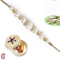 Handcrafted Natural Pearl Rakhi with American Diamonds,Regular Rakhi, Buy Rakhi, Send Rakhi to India, Rakhi Gifts, Rakhis Online